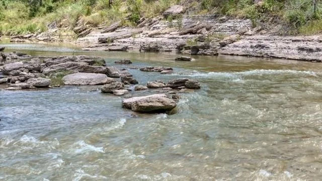 a view of a lake with outdoor space