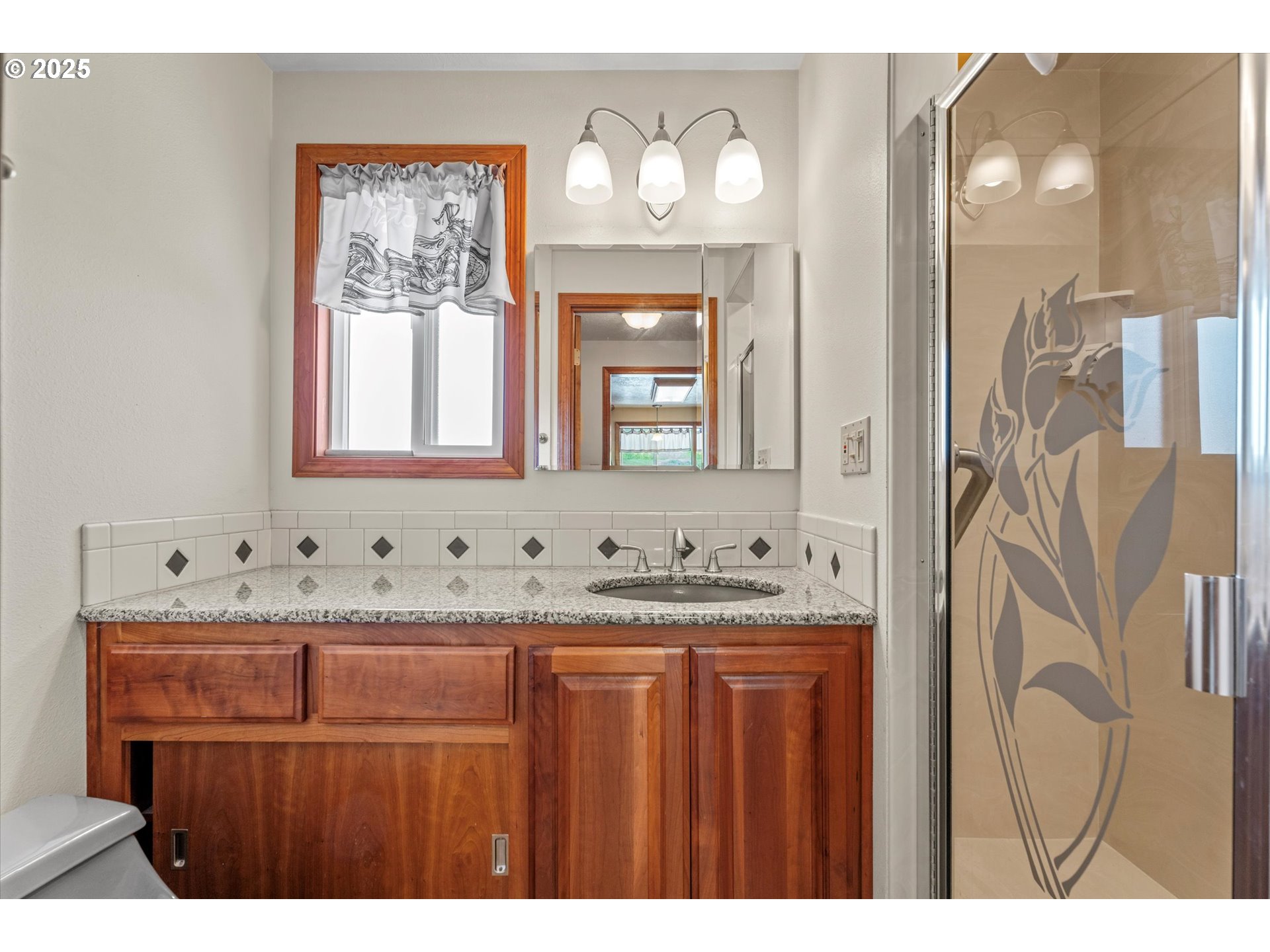 32117 Bellinger Scale Road Lebanon, OR 97355 - Photo 19 of 40 a bathroom with a sink vanity and a mirror