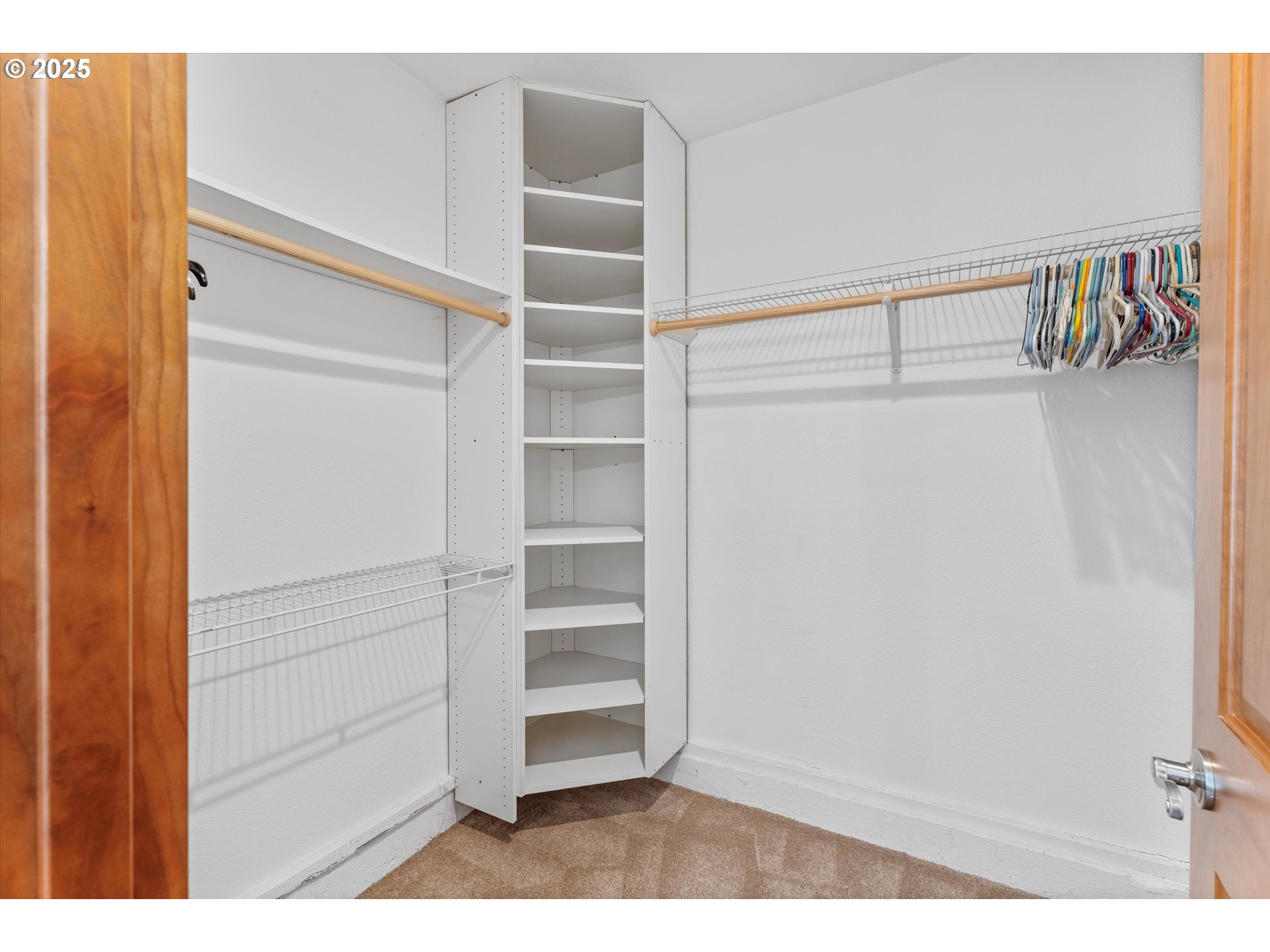 32117 Bellinger Scale Road Lebanon, OR 97355 - Photo 23 of 40 a view of walk in closet with empty racks