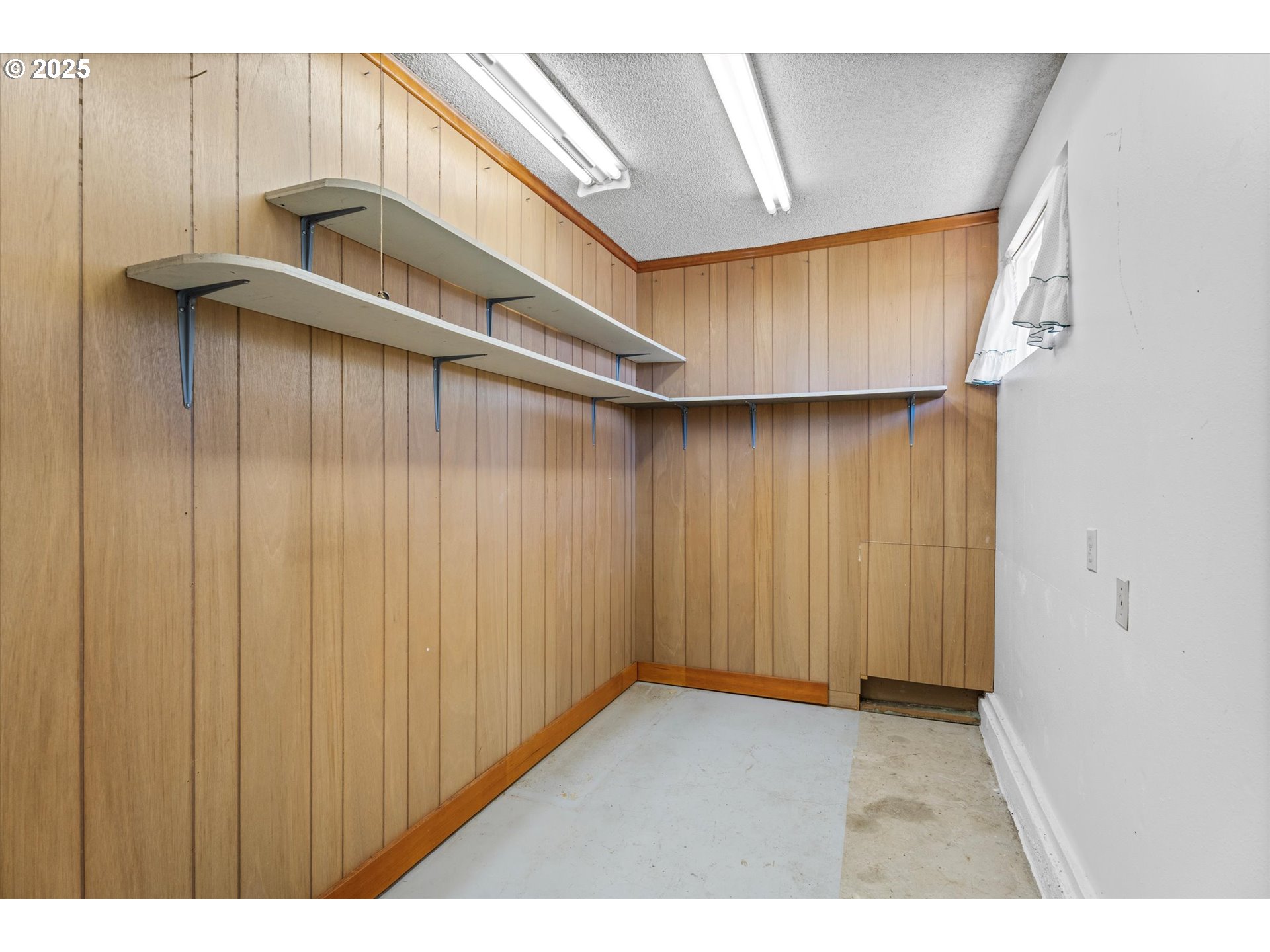 32117 Bellinger Scale Road Lebanon, OR 97355 - Photo 25 of 40 a view of a back yard from a wooden wall