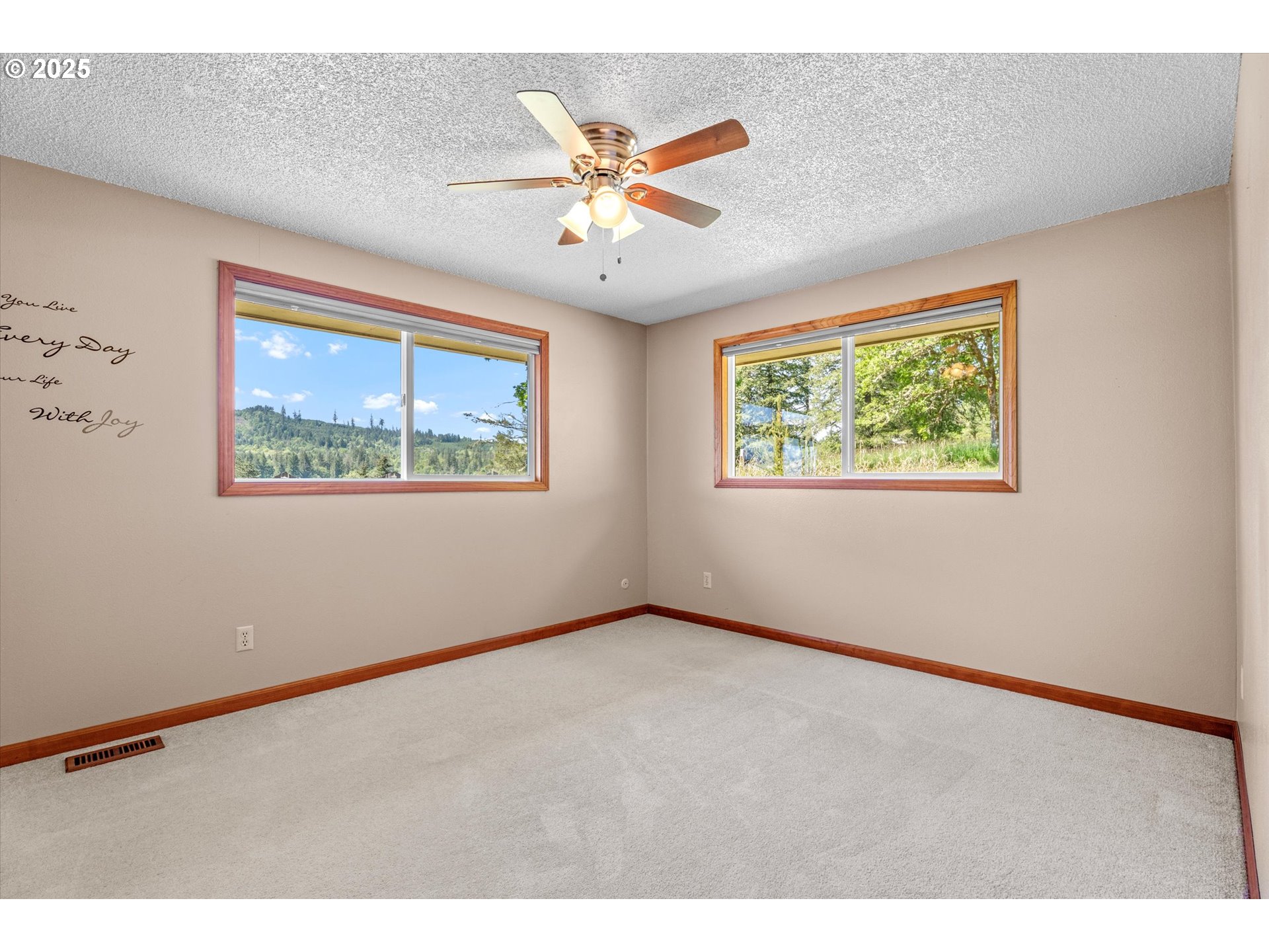 32117 Bellinger Scale Road Lebanon, OR 97355 - Photo 27 of 40 an empty room with window and ceiling fan