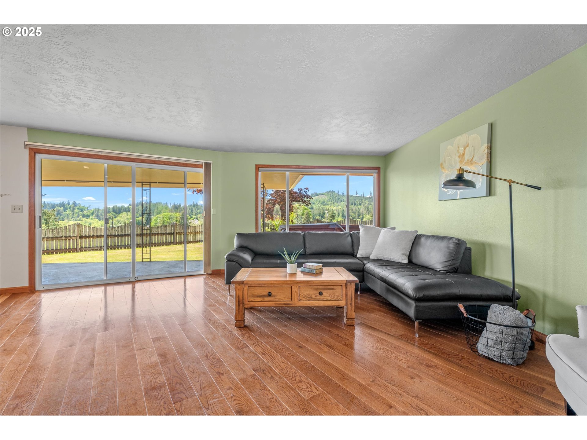 32117 Bellinger Scale Road Lebanon, OR 97355 - Photo 3 of 40 a living room with furniture and a large window