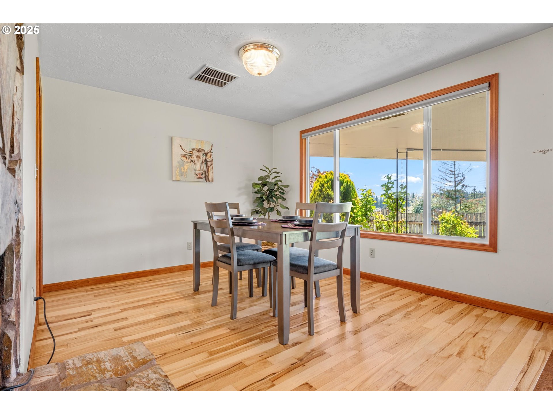 32117 Bellinger Scale Road Lebanon, OR 97355 - Photo 4 of 40 a view of a dining room with furniture window and outside view