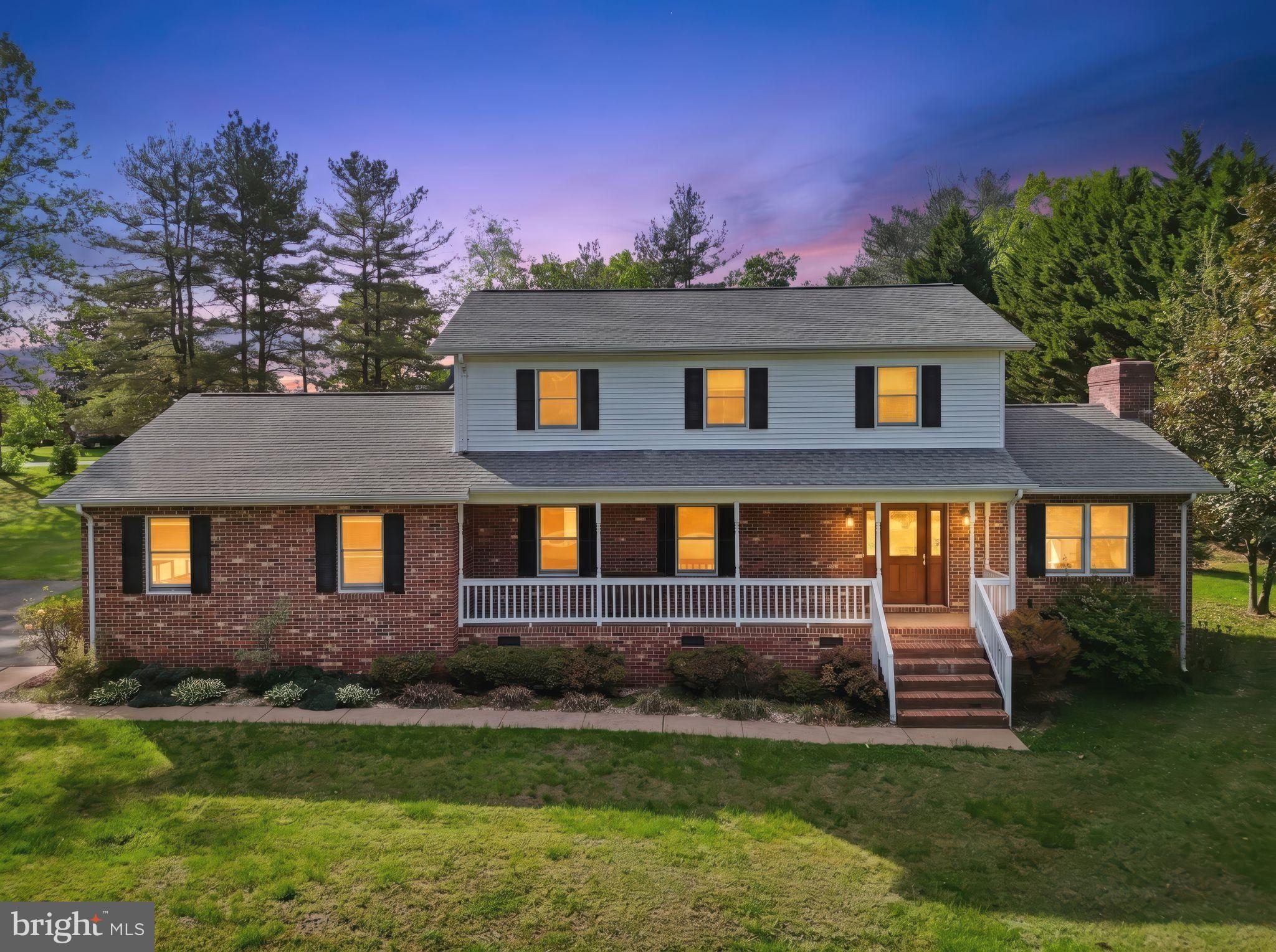 13360 Cameron Court Boston, VA 22713 - Photo 18 of 76 a front view of a house with a garden