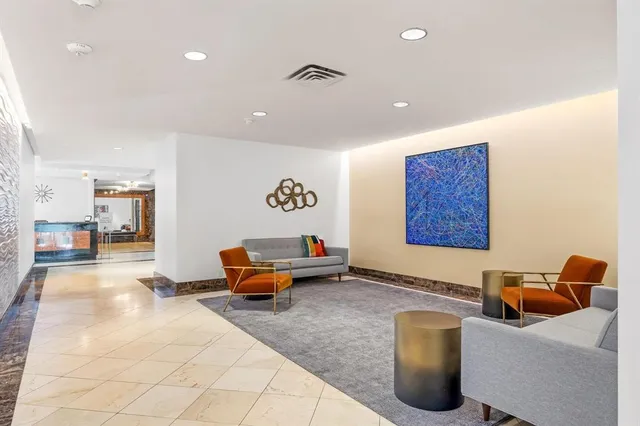 a living room with furniture and a couch