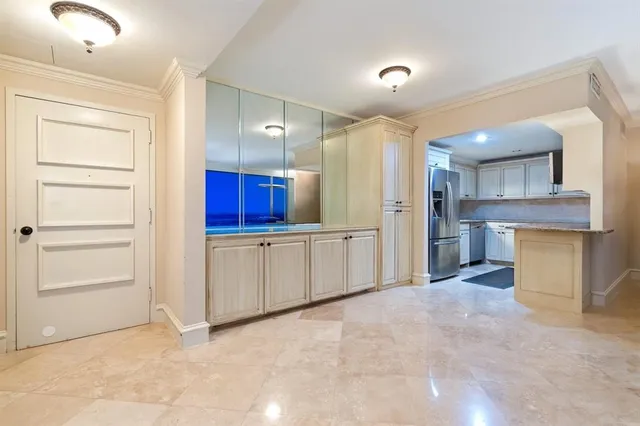 a bedroom with a bed and a table in it