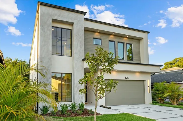 a front view of a house having yard