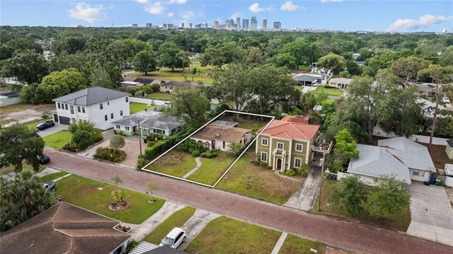 an aerial view of a house with a garden