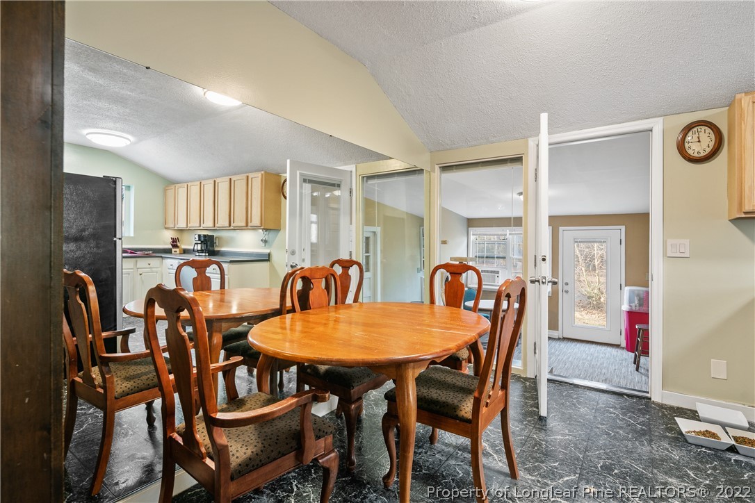 628 Tc Jones Road Raeford, NC 28376 - Photo 13 of 46 a dining room with furniture and window