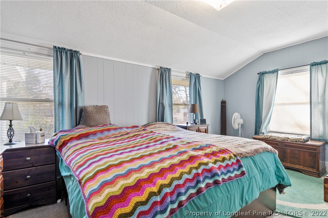 628 Tc Jones Road Raeford, NC 28376 - Photo 25 of 46 a bedroom with a bed and a window