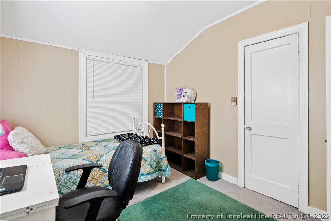628 Tc Jones Road Raeford, NC 28376 - Photo 30 of 46 a bedroom with a bed and a closet