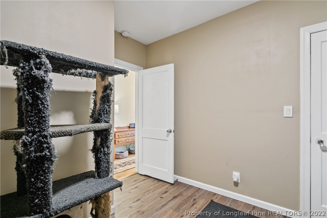 628 Tc Jones Road Raeford, NC 28376 - Photo 34 of 46 a view of a room with wooden floor and entryway