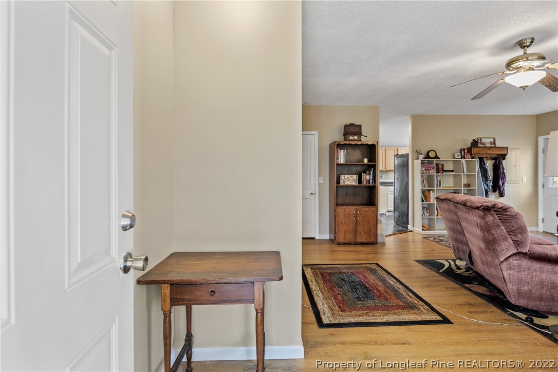 628 Tc Jones Road Raeford, NC 28376 - Photo 6 of 46 a living room with furniture and wooden floor