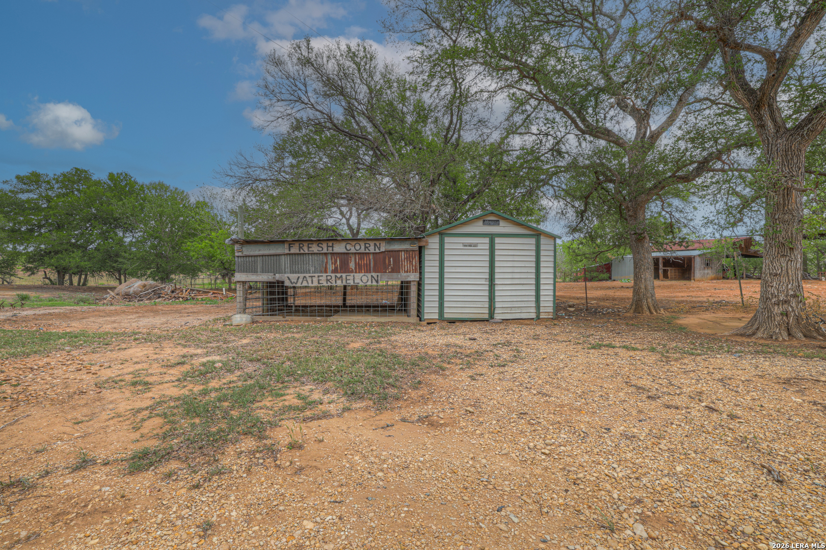 418 Fm 2984 Luling, TX 78648 - Photo 11 of 15 a view of a backyard with large trees