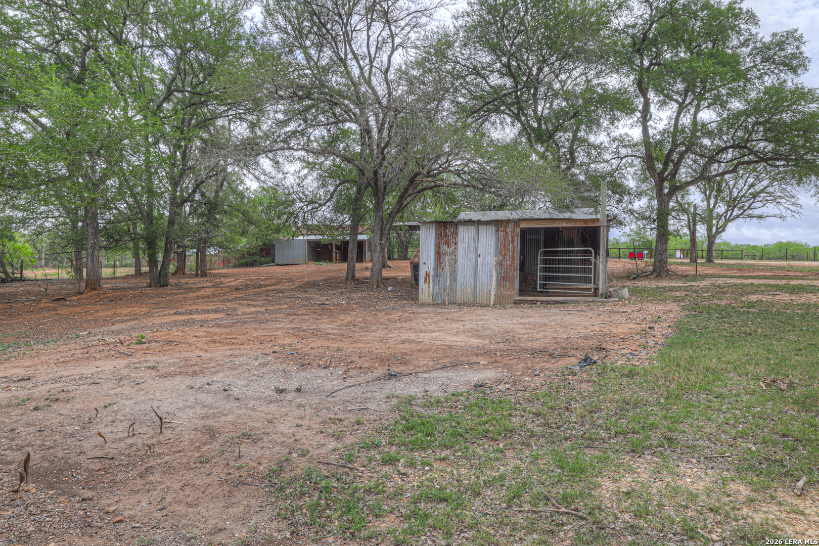 418 Fm 2984 Luling, TX 78648 - Photo 12 of 15 a front view of house with yard and trees
