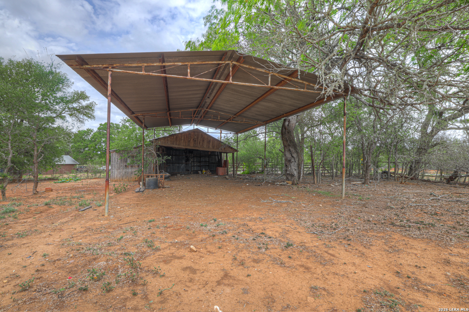 418 Fm 2984 Luling, TX 78648 - Photo 10 of 15 a view of a backyard with large trees