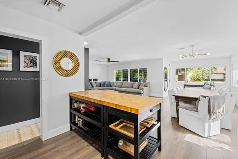 a bedroom with a bed and a table