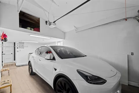 a view of a room with a potted plant