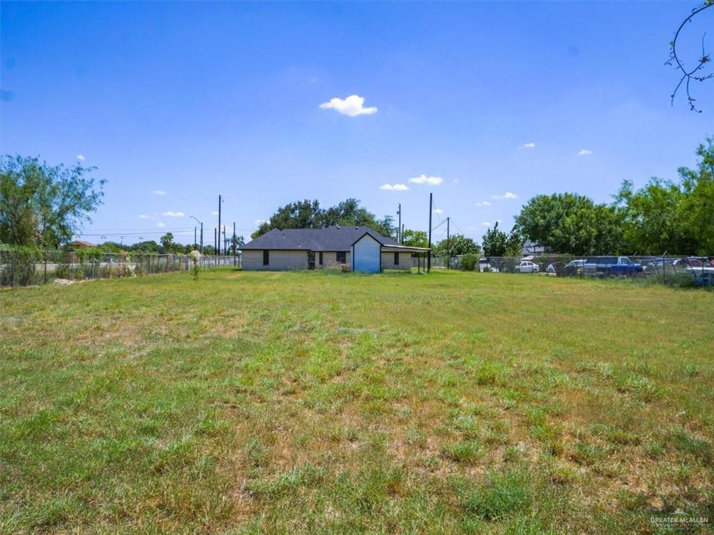 4507 West Rogers Road Edinburg, TX 78541 - Photo 18 of 21 a swimming pool with outdoor seating and yard