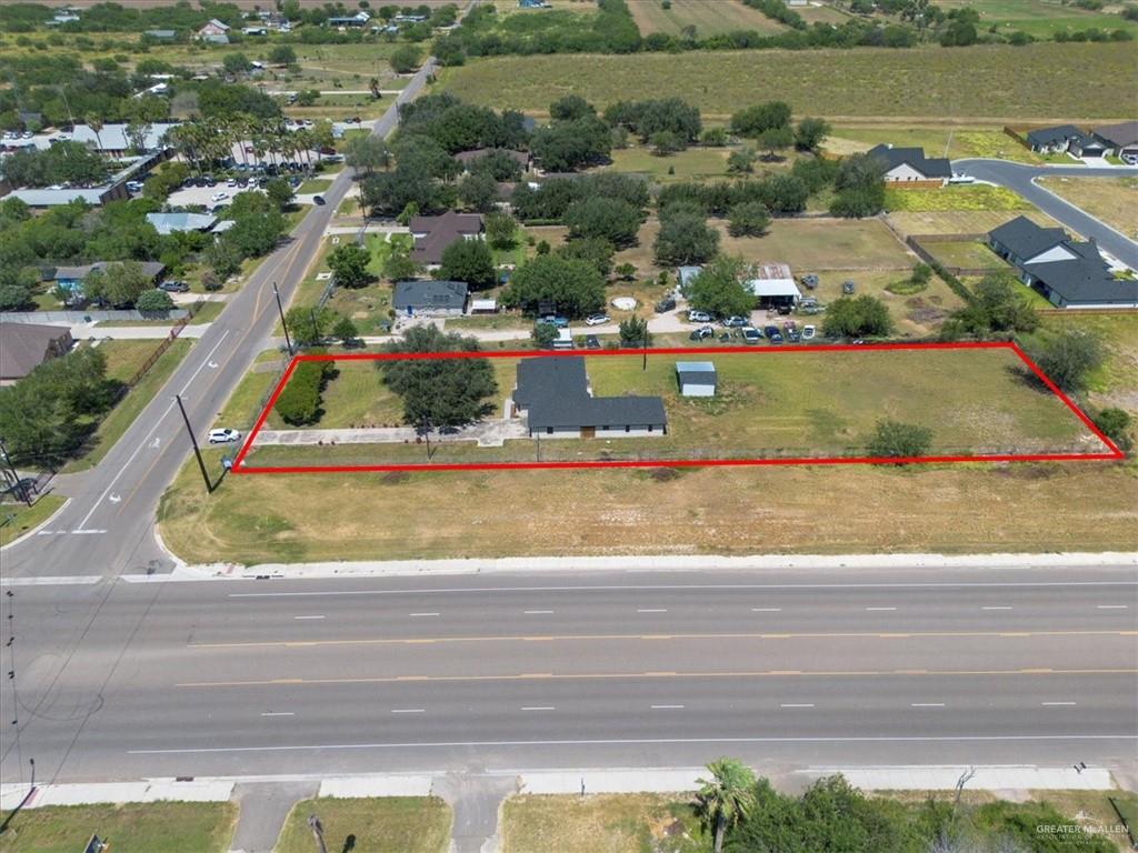 4507 West Rogers Road Edinburg, TX 78541 - Photo 20 of 21 an aerial view of a house with a yard and lake view