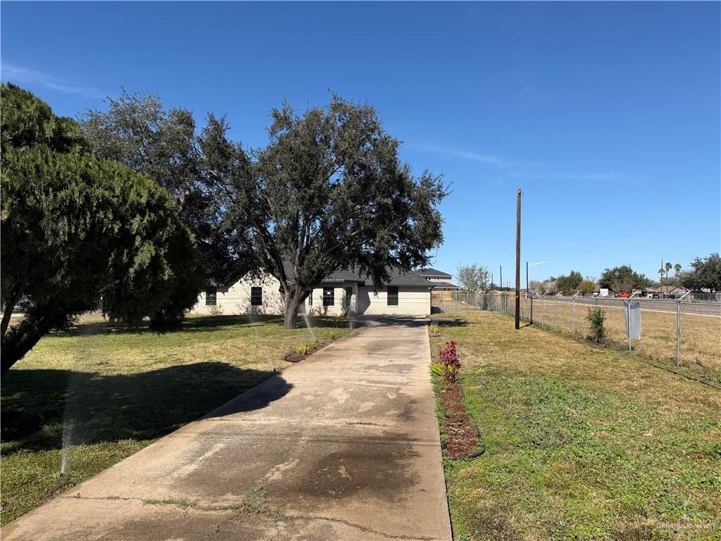 4507 West Rogers Road Edinburg, TX 78541 - Photo 2 of 21 a view of a lake with houses
