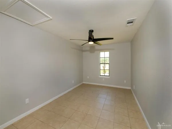 a view of an empty room and window