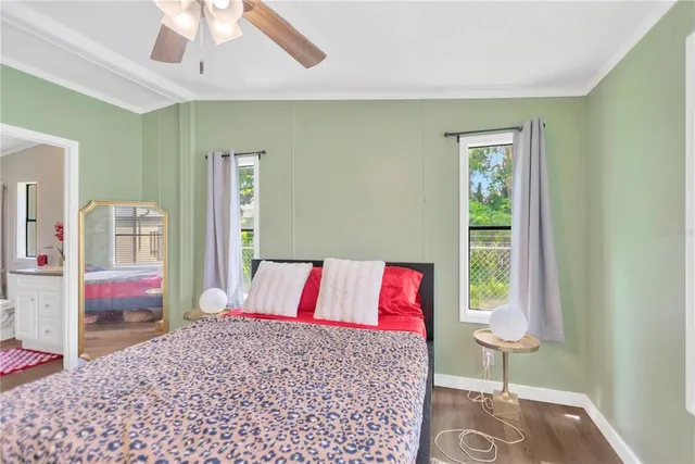 a bedroom with a bed and a table