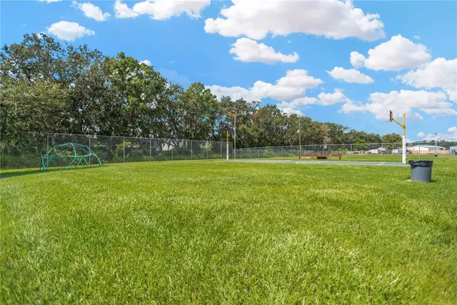 a view of a golf course with a lake