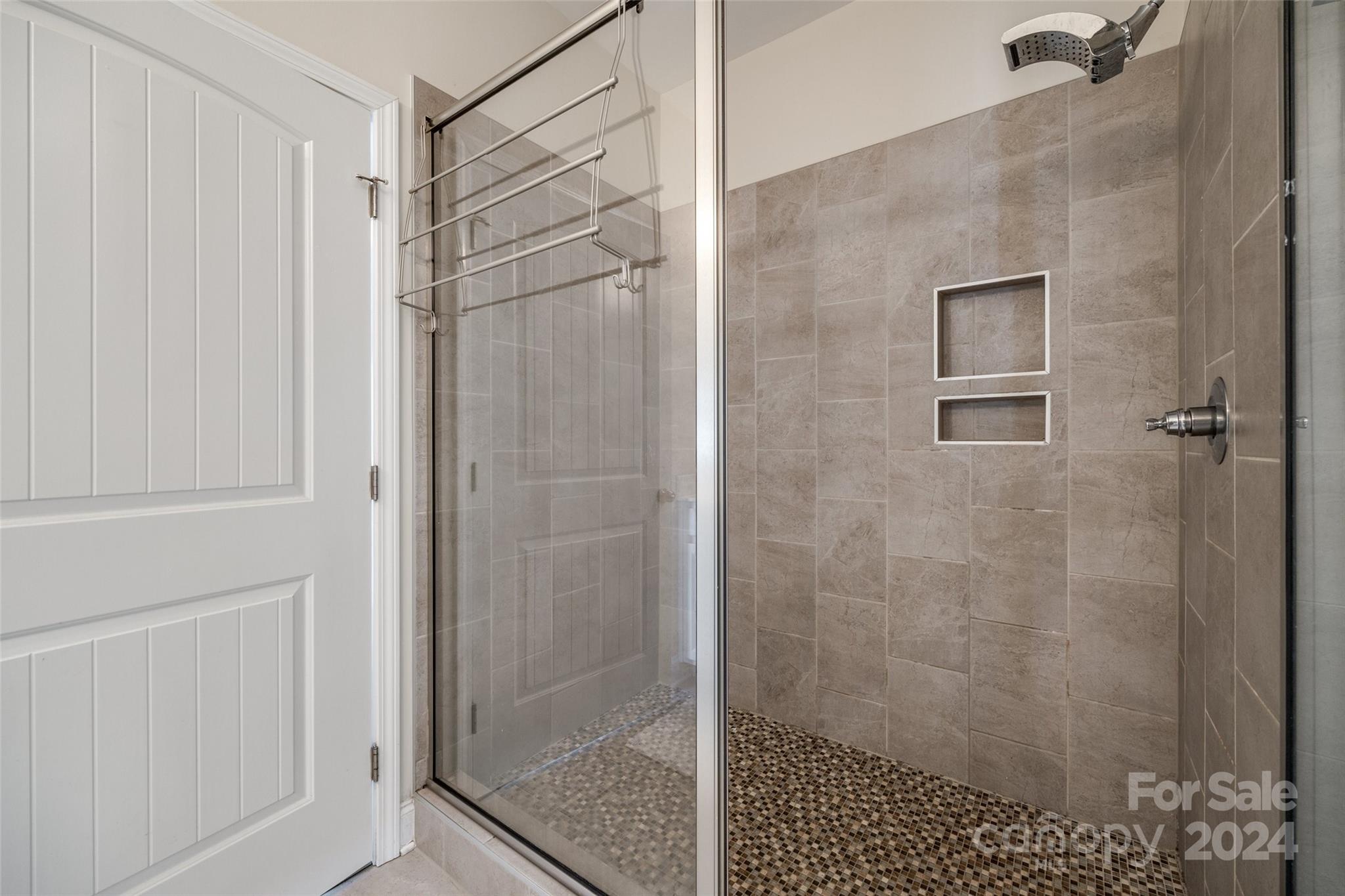 4725 Olive Branch Road Wingate, NC 28174 - Photo 23 of 39 a bathroom with a shower