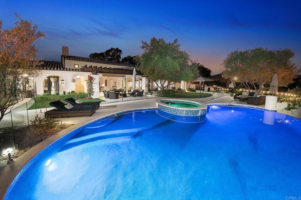 7567 Northern Lights San Diego, CA 92127 - Photo 1 of 50 a swimming pool with outdoor seating and yard