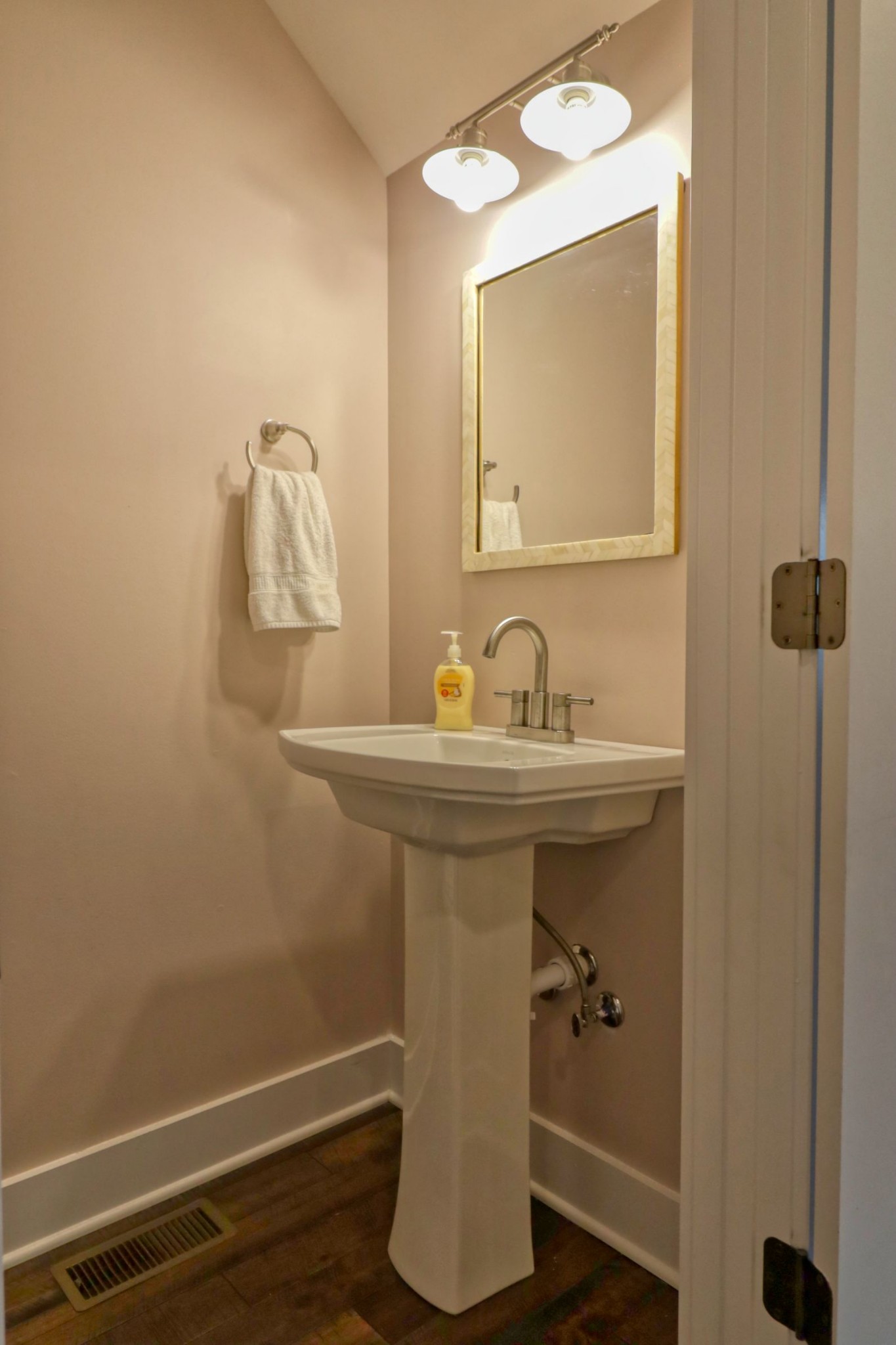 1658 Center Star Road Columbia, TN 38401 - Photo 12 of 36 a bathroom with a sink a light fixture and a toilet