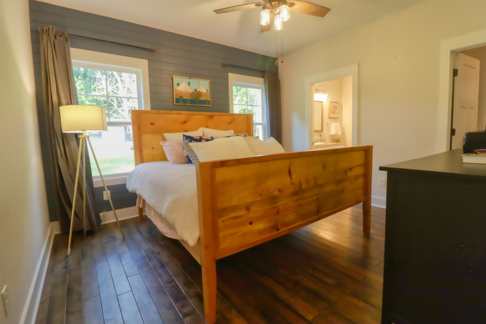 1658 Center Star Road Columbia, TN 38401 - Photo 13 of 36 a bed room with a bed and a chandelier
