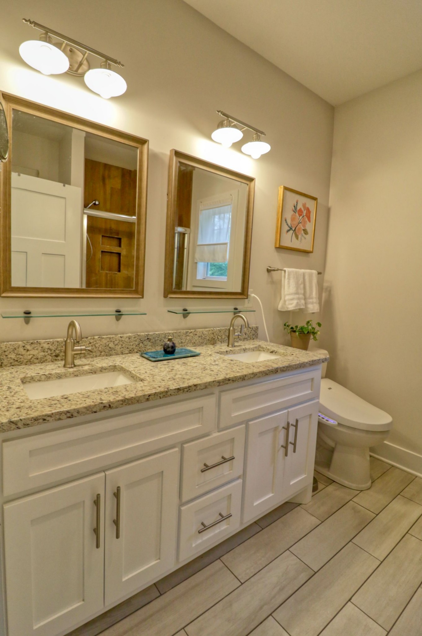 1658 Center Star Road Columbia, TN 38401 - Photo 14 of 36 a bathroom with a granite countertop double vanity sink mirror and