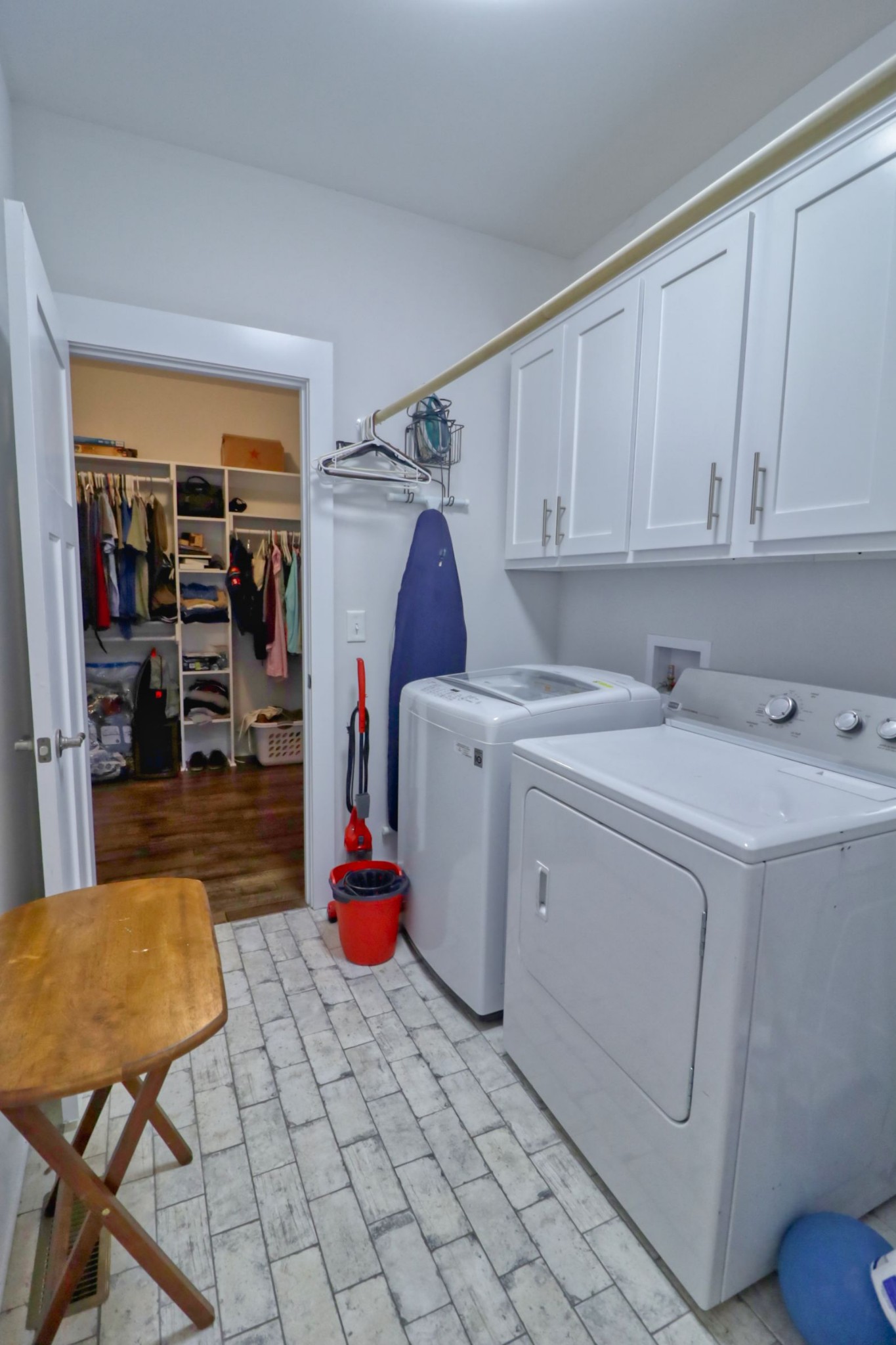 1658 Center Star Road Columbia, TN 38401 - Photo 17 of 36 a utility room with cabinets washer and dryer