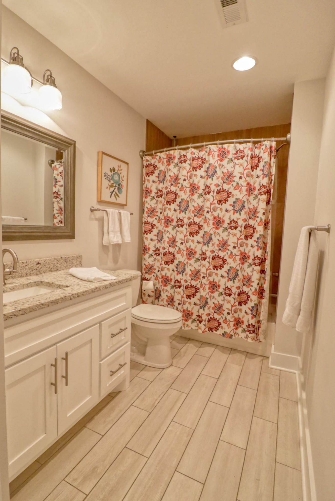 1658 Center Star Road Columbia, TN 38401 - Photo 21 of 36 a spacious bathroom with a granite countertop sink a toilet and a shower