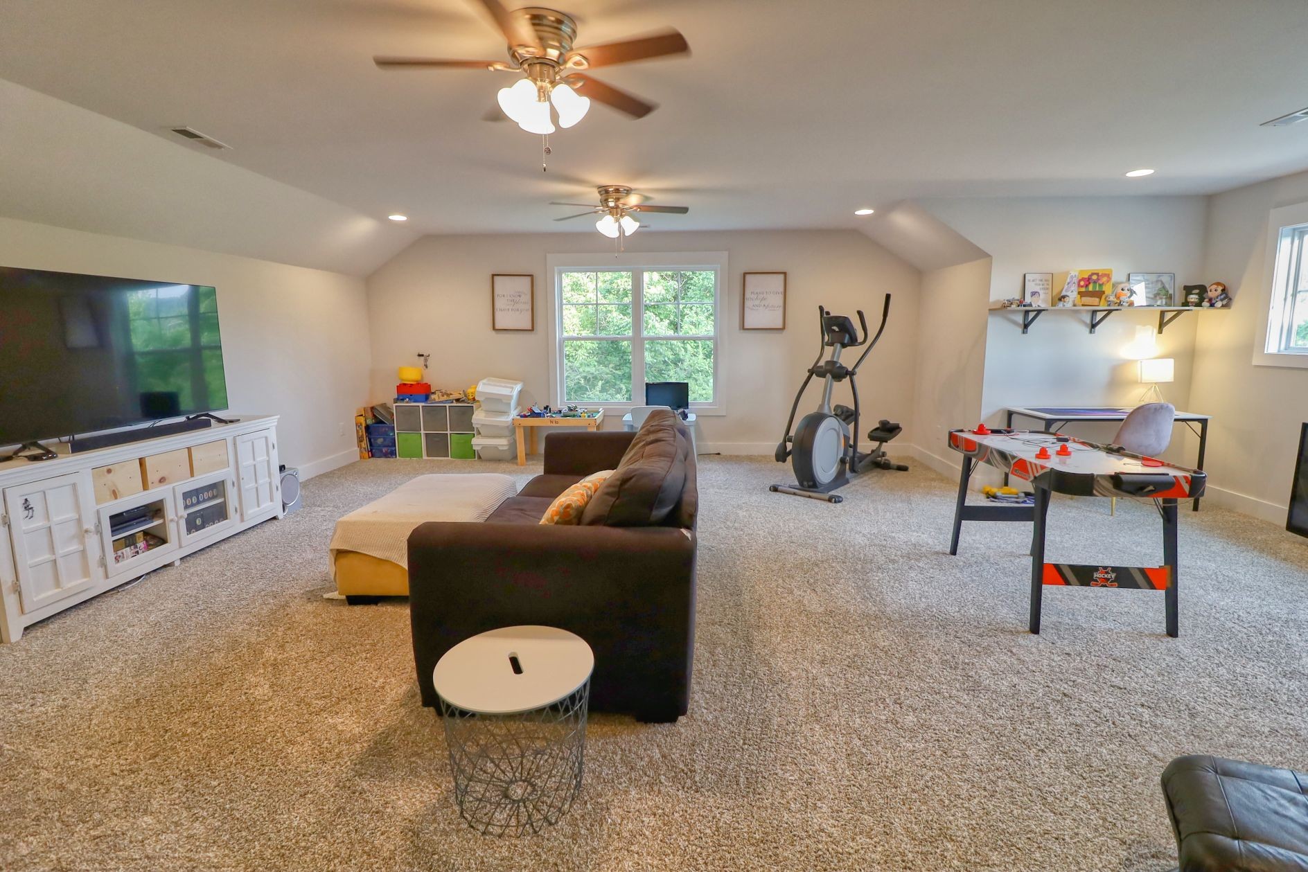 1658 Center Star Road Columbia, TN 38401 - Photo 24 of 36 a living room with furniture a large window and a flat screen tv