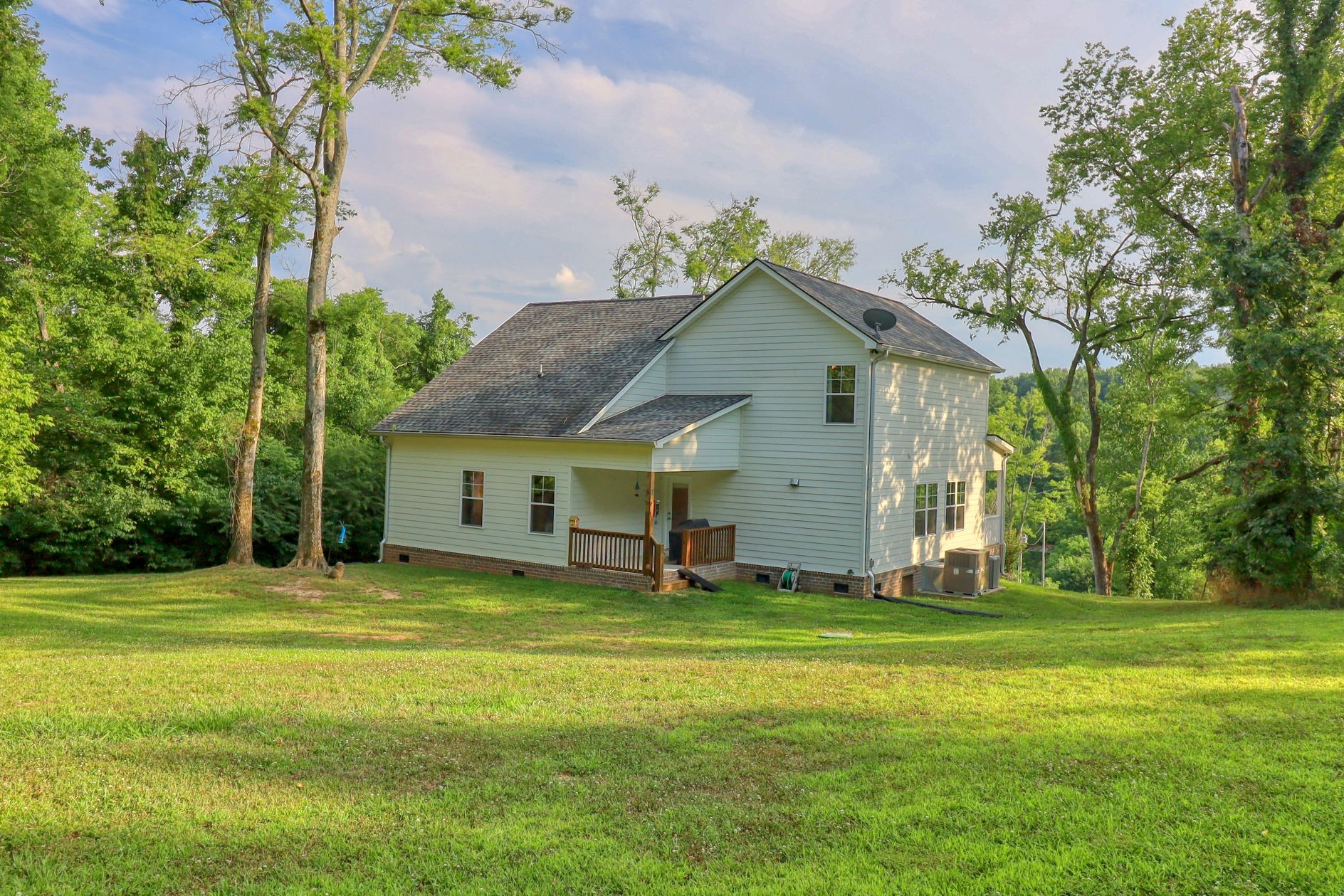 1658 Center Star Road Columbia, TN 38401 - Photo 31 of 36 a big house with a big yard and large trees