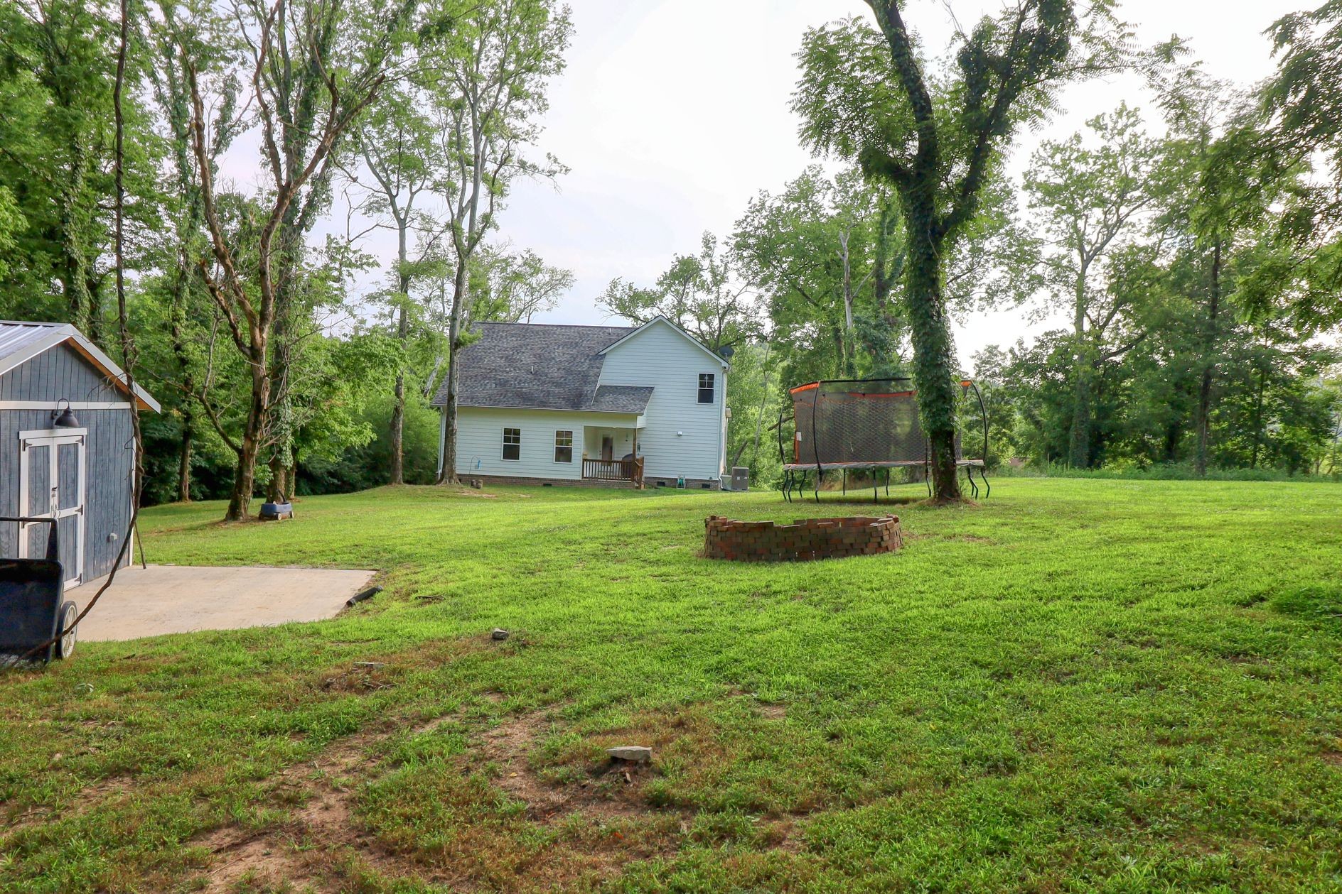1658 Center Star Road Columbia, TN 38401 - Photo 32 of 36 a view of a house with a yard porch and sitting area