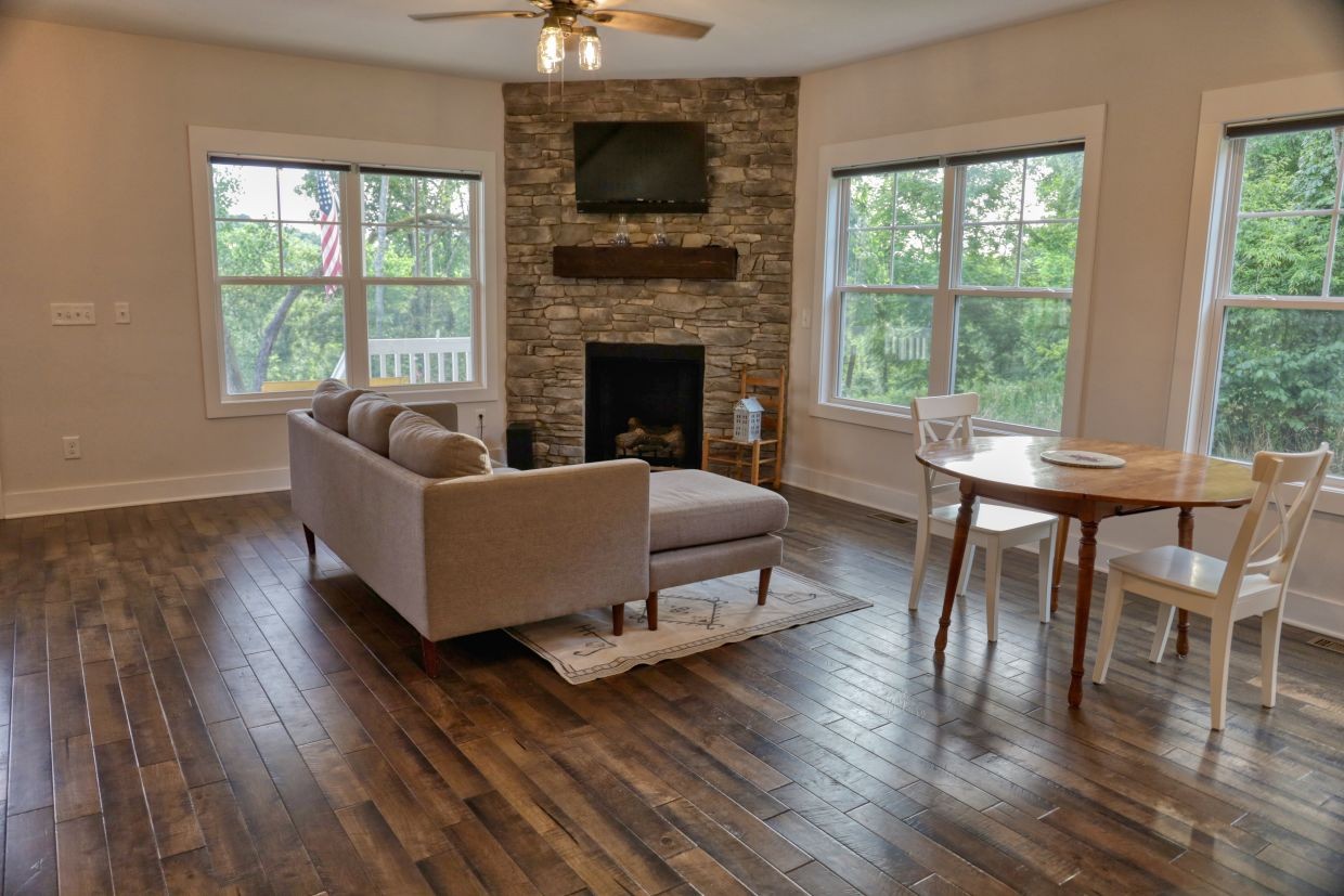 1658 Center Star Road Columbia, TN 38401 - Photo 8 of 36 a living room with furniture wooden floor and a fireplace