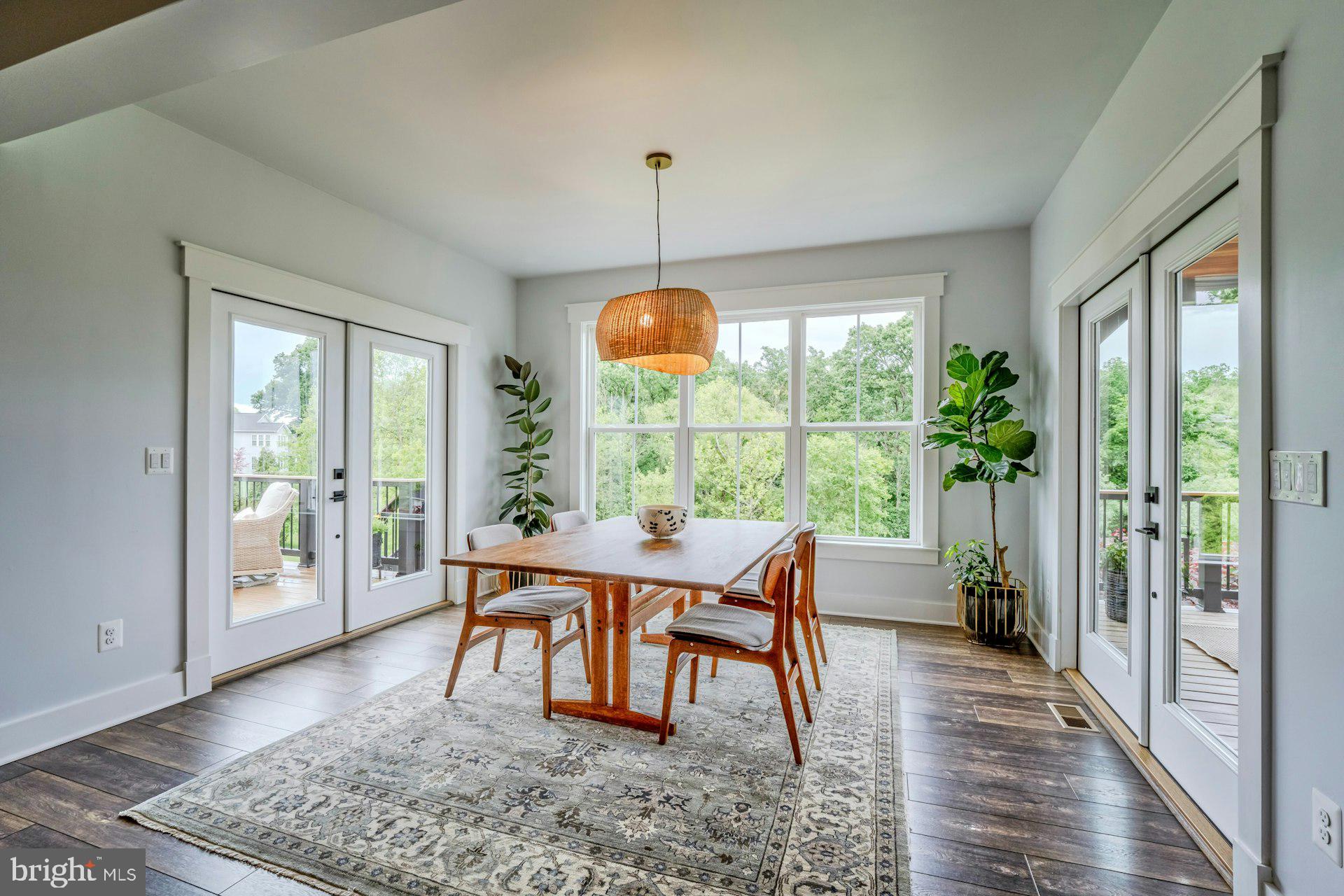 18120 Ridgewood Place Round Hill, VA 20141 - Photo 11 of 46 a dining room with furniture window and wooden floor