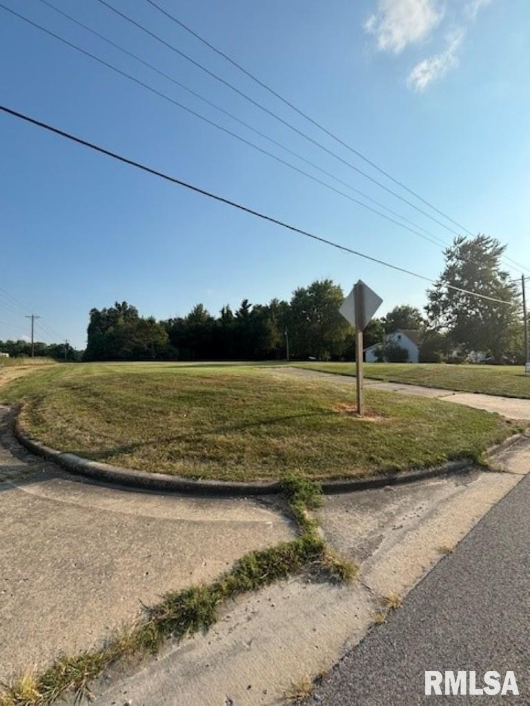 9485 Highway 15 Mount Vernon, IL 62864 - Photo 11 of 11 a view of a swimming pool with a lake view and mountain in the back