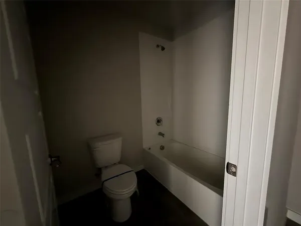 a view of empty room with windows