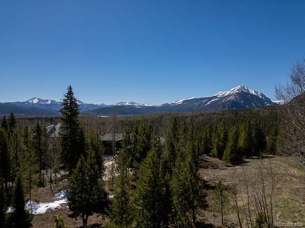 a view of a lake with a mountain in the background