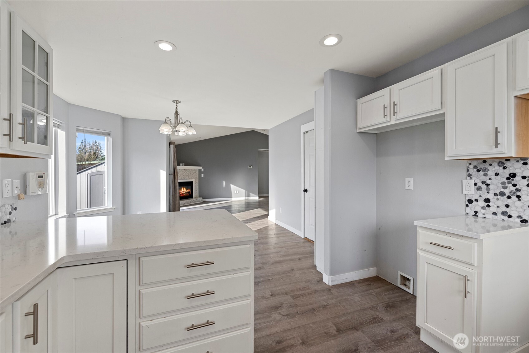 827 John Liner Road Sedro-Woolley, WA 98284 - Photo 13 of 36 a kitchen with a refrigerator and white cabinets