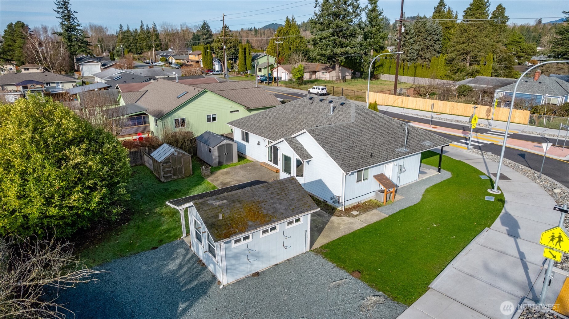 827 John Liner Road Sedro-Woolley, WA 98284 - Photo 28 of 36 an aerial view of a house with garden space and street view