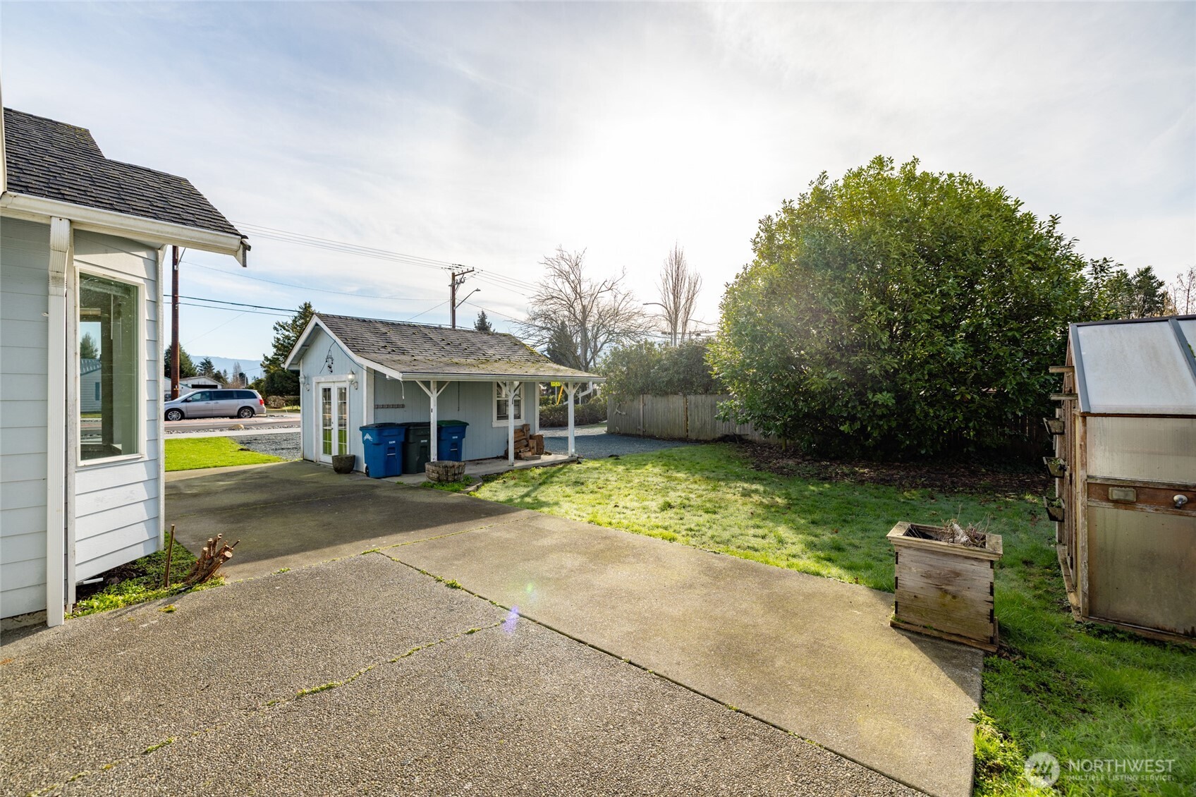 827 John Liner Road Sedro-Woolley, WA 98284 - Photo 33 of 36 a view of a house with a backyard and a patio
