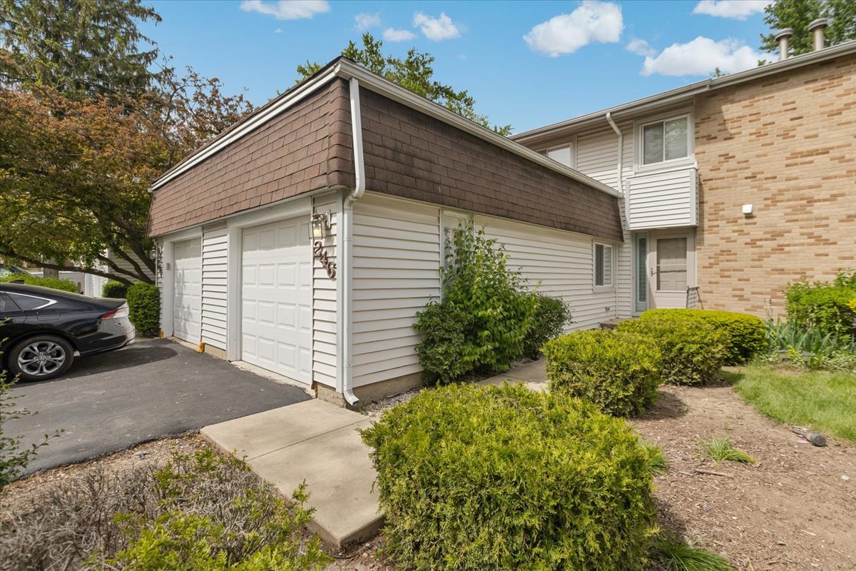 246 Monroe Road Bolingbrook, IL 60440 - Photo 1 of 32 a view of a house with a yard
