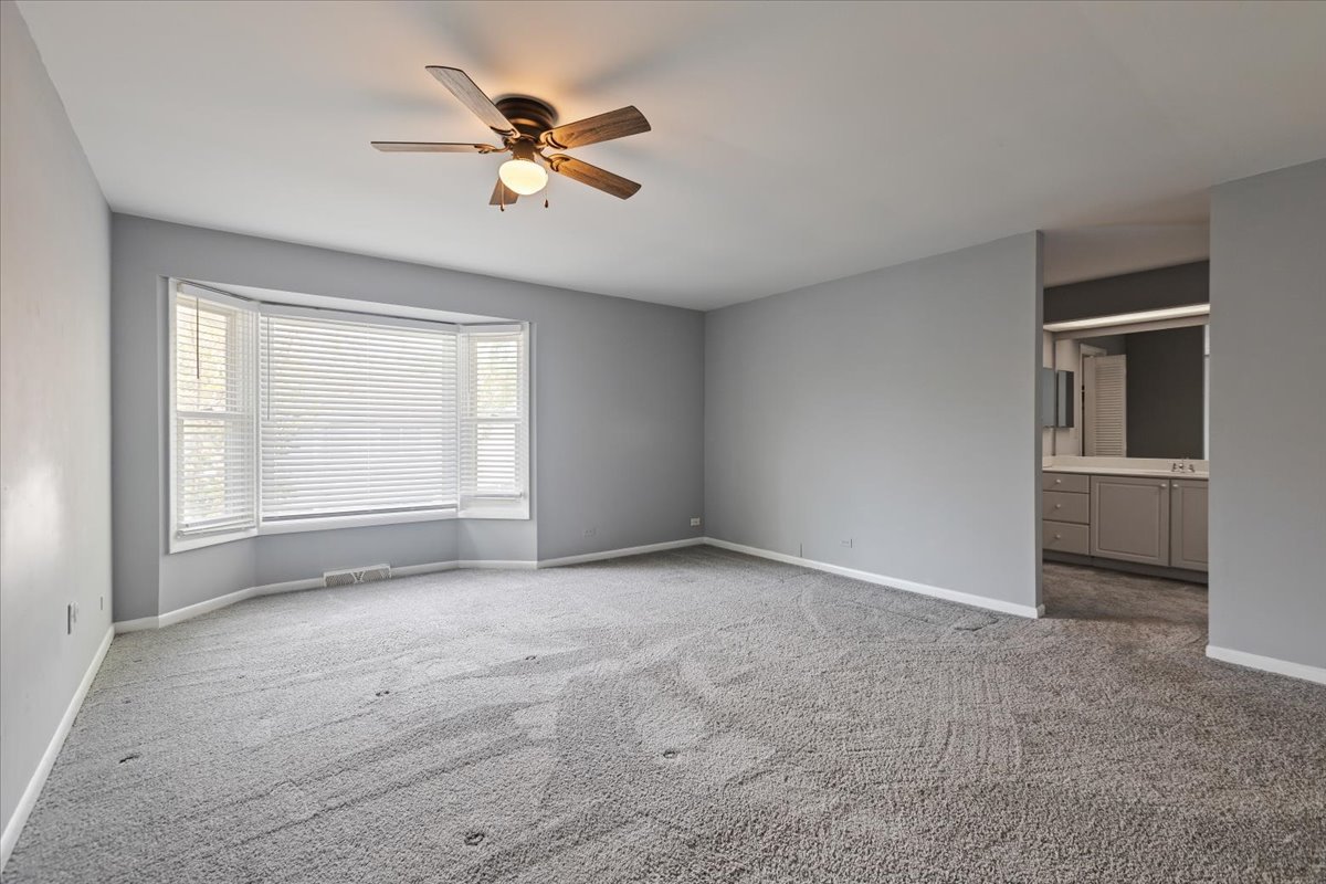 246 Monroe Road Bolingbrook, IL 60440 - Photo 15 of 32 a view of an empty room with a window