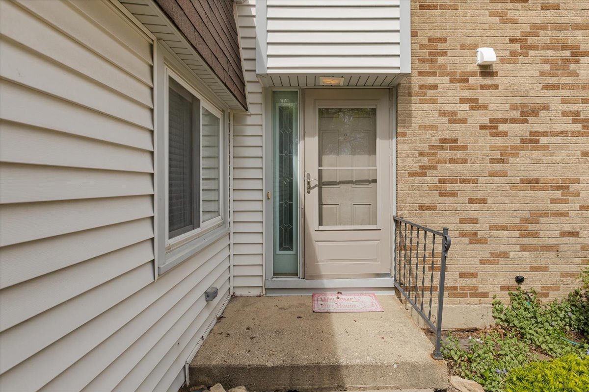 246 Monroe Road Bolingbrook, IL 60440 - Photo 2 of 32 a view of front door of house with stairs