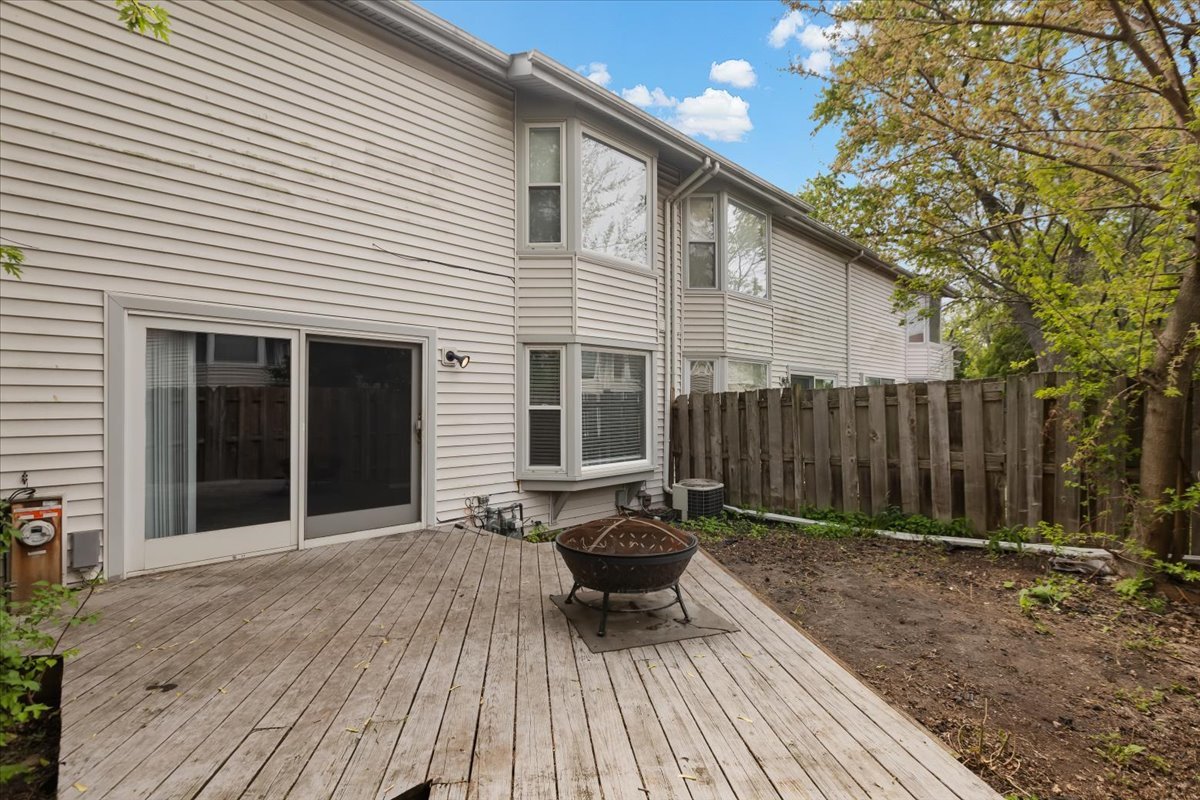 246 Monroe Road Bolingbrook, IL 60440 - Photo 27 of 32 a view of a house with backyard and wooden fence